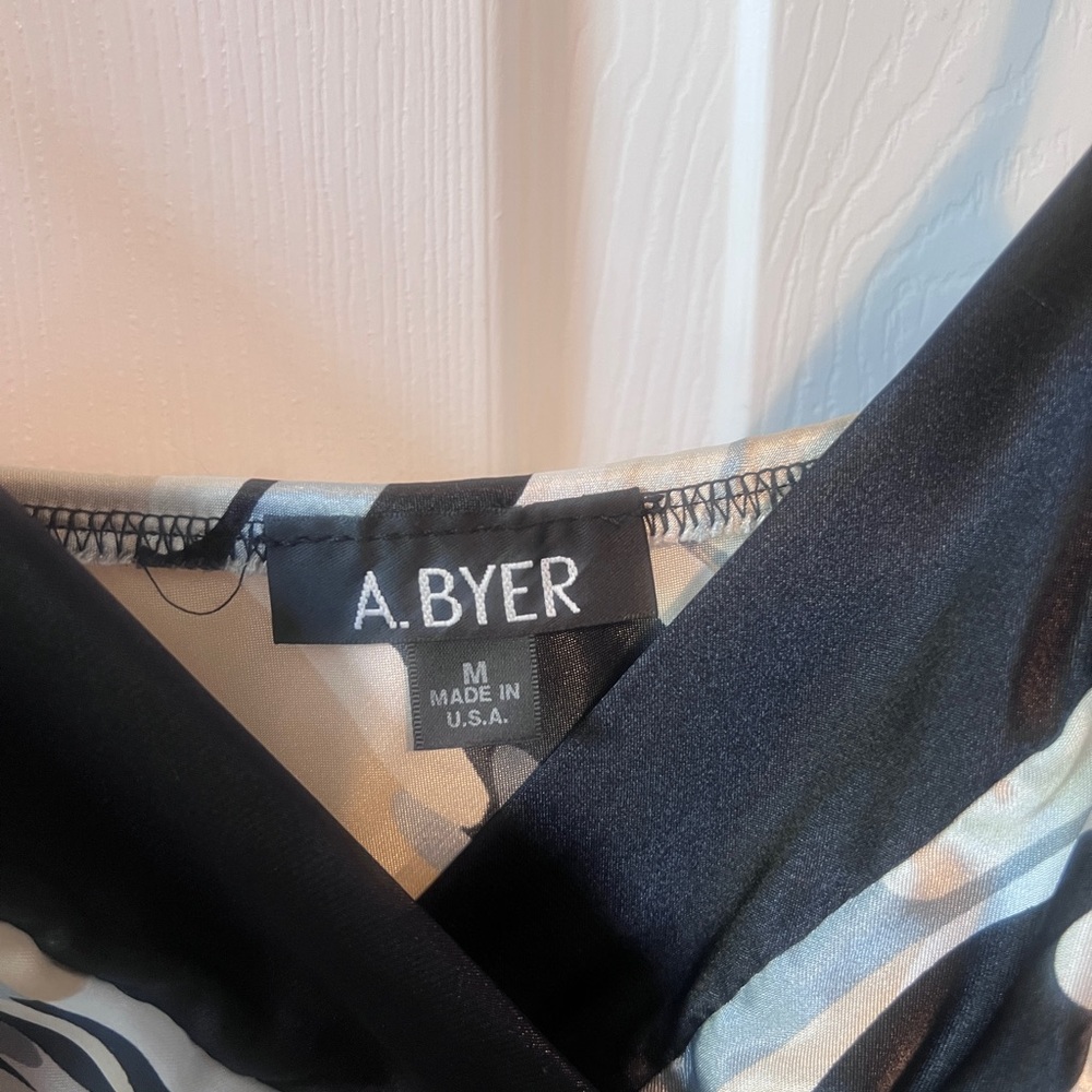 A. Byer tank top medium. 100% polyester